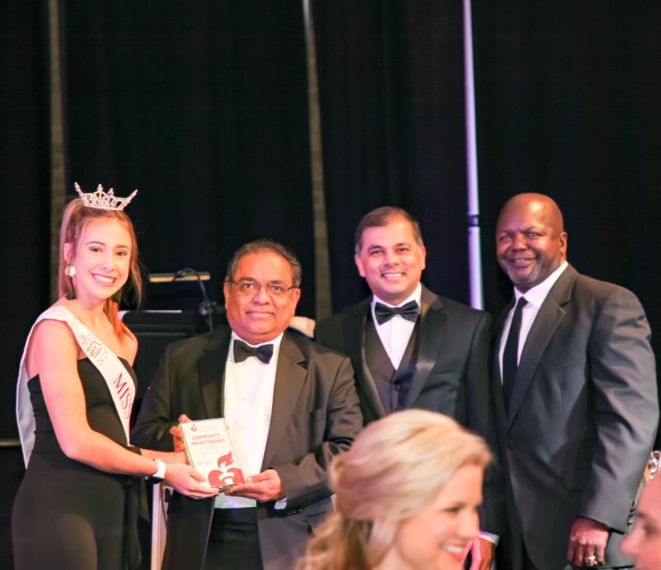 Presentation of the Community Impact Award.
